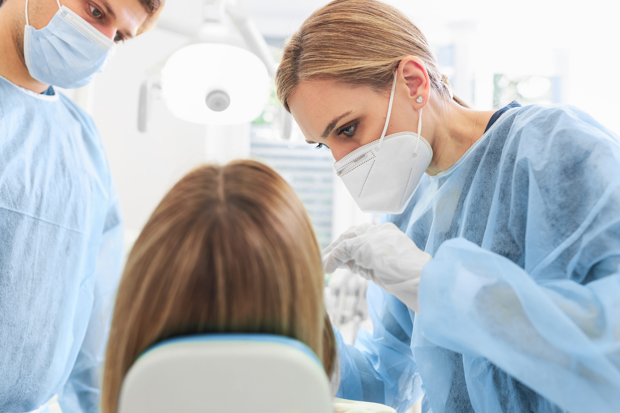 Close,Up,Of,Woman,Dentist,With,Face,Mask,And,With